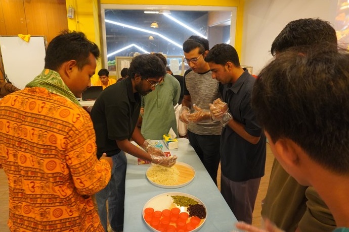 The 'Indian Cuisine DIY Experience' utilizes food to guide participants in understanding Indian dietary culture.